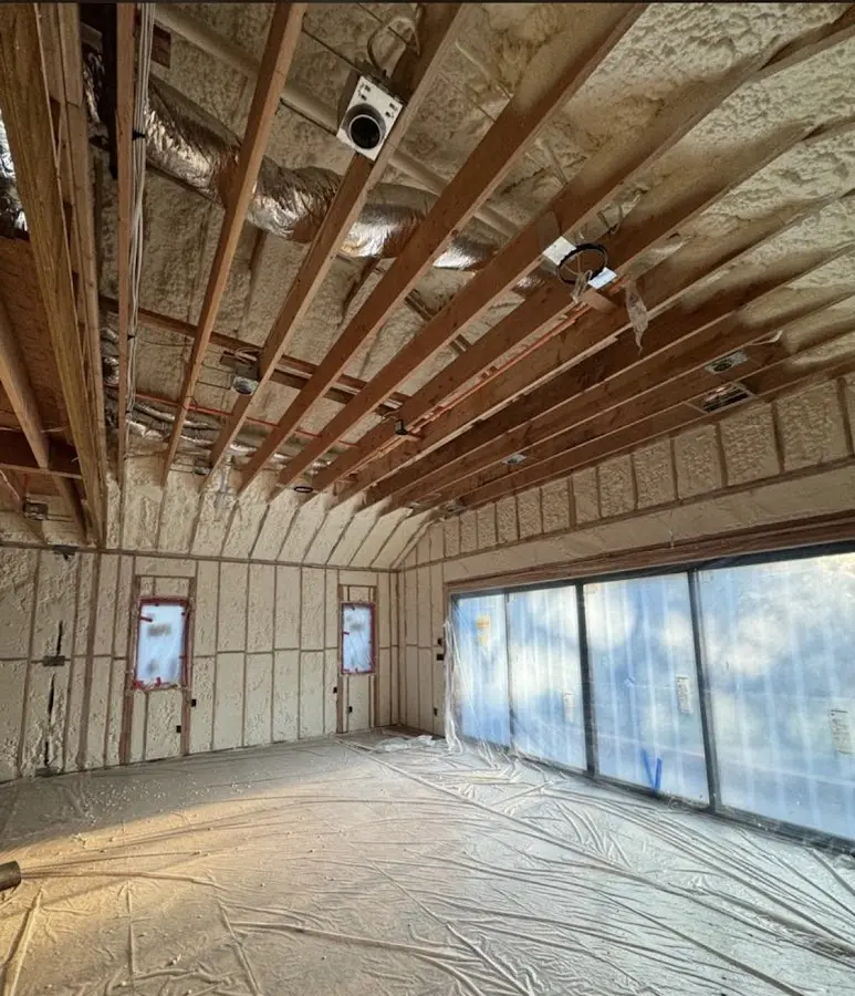 Interior walls and ceiling insulated with spray foam during new construction in Hampton